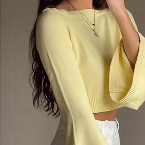 Revolve cropped sweater in pastel yellow. The Brand is lover and friends. - Picture 2 of 3